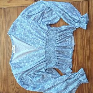 Cropped peplum with puffed sleeves